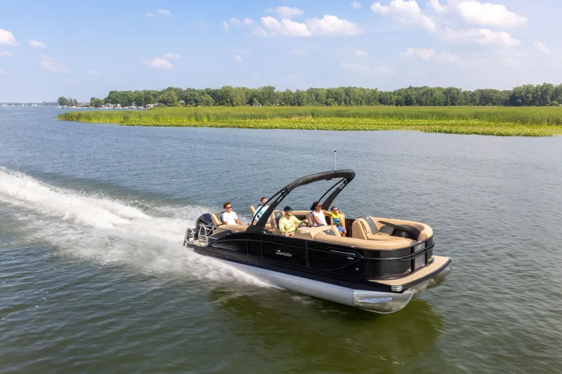 The Image of 2026 Barletta Cabrio 24 M pontoon boat on a lake. - 0