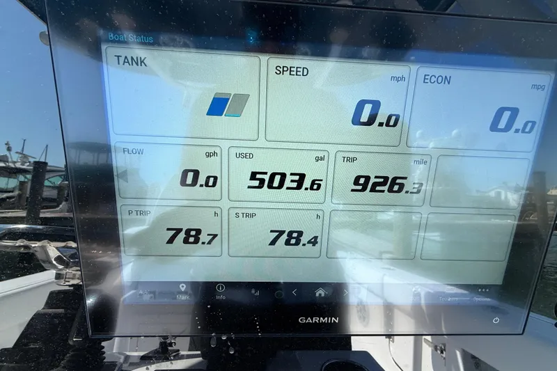 Slide: The Image of Display screen of a 2024 Sportsman Open 262 Center Console boat showing trip data. - 34