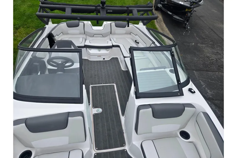 Slide: The Image of 2025 Yamaha Boats AR190 interior with sleek seating and modern design. - 19