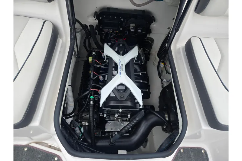 Slide: The Image of 2025 Yamaha Boats AR190 engine compartment showcasing high-performance components. - 23