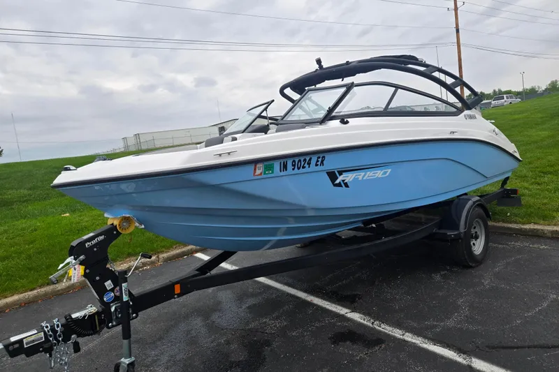 Slide: The Image of 2025 Yamaha Boats AR190 on trailer, parked outdoors on a cloudy day. - 5
