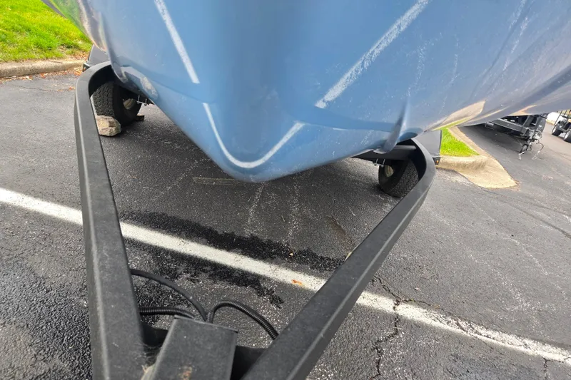 Slide: The Image of 2025 Yamaha Boats AR190 on trailer, parked on asphalt. - 7