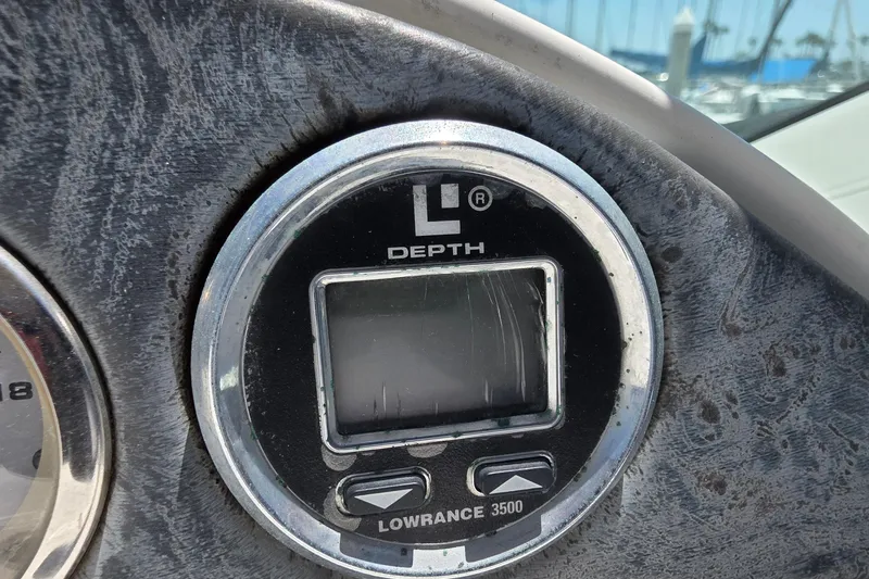Slide: The Image of Depth gauge on 2001 Doral 250se boat dashboard, Lowrance 3500 model. - 26