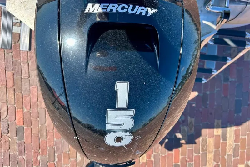 Slide: The Image of Mercury 150 horsepower outboard motor on 2023 Cypress Cay Seabreeze 232 boat. - 11