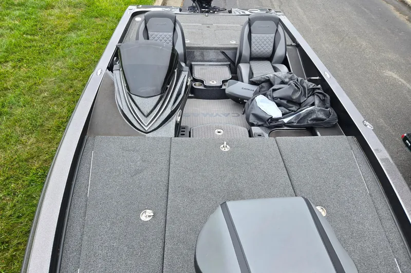 Slide: The Image of 2022 Caymas CX 19 boat interior with seating and storage compartments. - 20