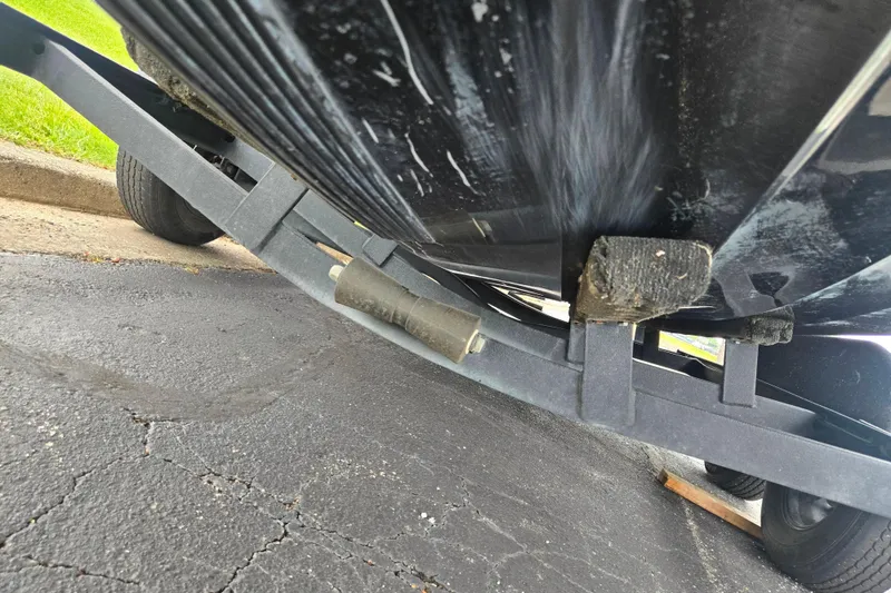 Slide: The Image of Underside view of a 2022 Caymas CX 19 boat on a trailer. - 8
