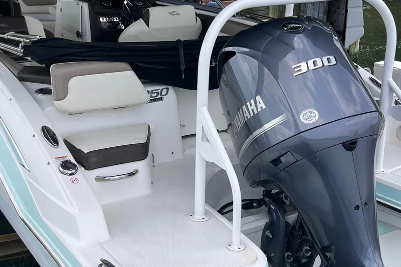 Slide: The Image of 2019 Chaparral 250 Suncoast boat with Yamaha 300 outboard engine, interior seating view. - 21