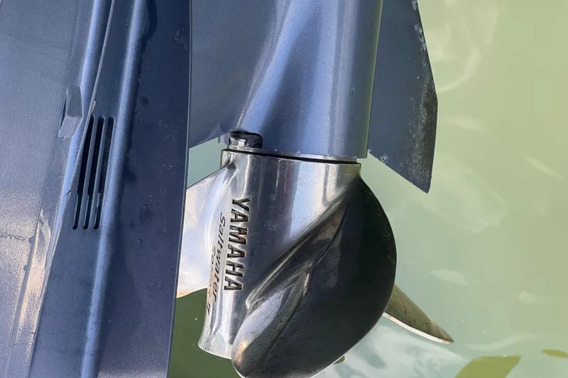 Slide: The Image of Yamaha outboard motor propeller on 2019 Chaparral 250 Suncoast boat. - 26