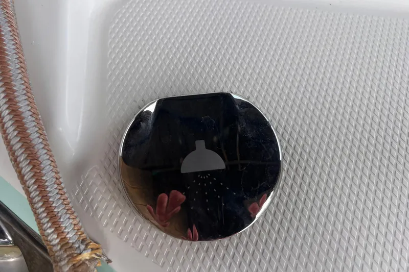 Slide: The Image of Chrome shower cover on 2019 Chaparral 250 Suncoast boat deck. - 32