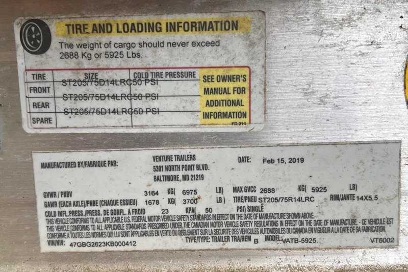 Slide: The Image of Tire and loading information label for 2019 Chaparral 250 Suncoast, detailing weight and pressure specifications. - 49