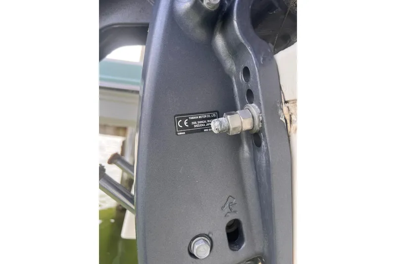 Slide: The Image of Close-up of a 2019 Chaparral 250 Suncoast boat engine mount detail. - 60