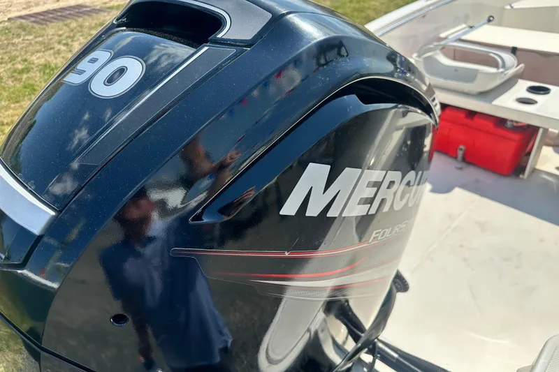 Slide: The Image of Mercury outboard engine on a 2019 Boston Whaler 160 Super Sport boat. - 3