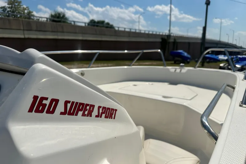 Slide: The Image of 2019 Boston Whaler 160 Super Sport boat, close-up view, sunny day background. - 6