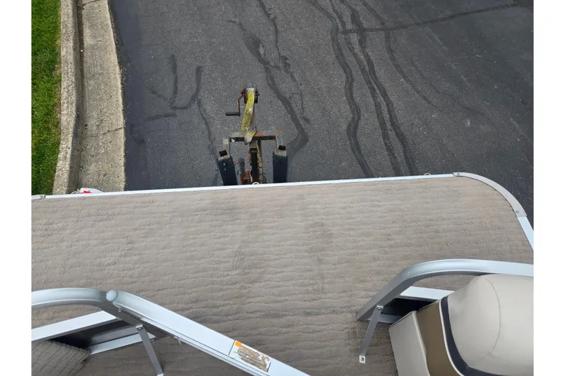 Slide: The Image of 2012 Misty Harbor 2285 Biscayne Bay RL pontoon boat on trailer, viewed from above. - 23