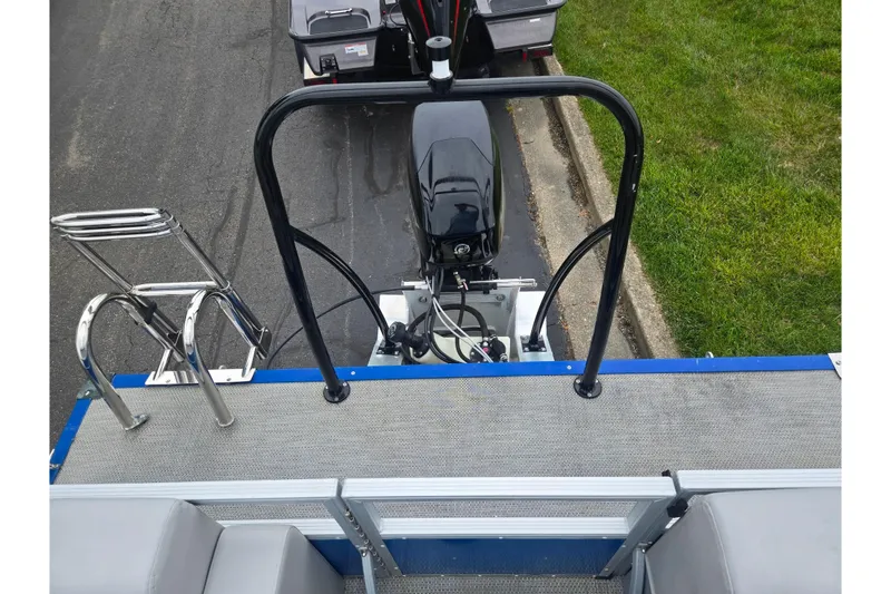 Slide: The Image of Top view of a 2021 Lexington 315 boat with motor and ladder. - 17
