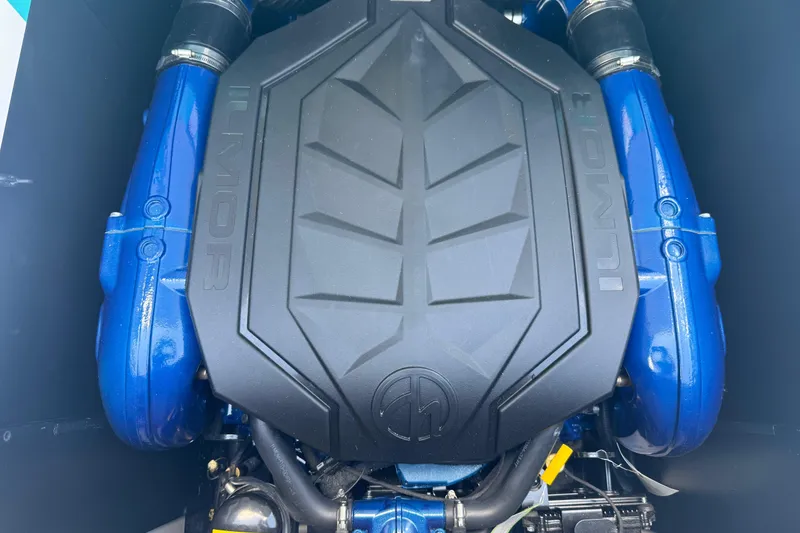 Slide: The Image of Engine of 2025 MasterCraft XT24 boat, featuring Ilmor branding and blue components. - 20