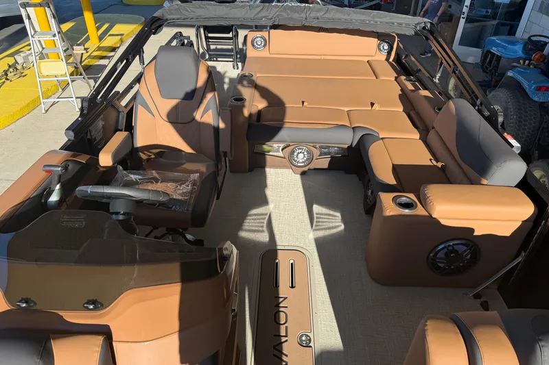 Slide: The Image of Interior of 2026 Avalon 2385 LSZ VRL boat with luxurious tan seating and modern design. - 3