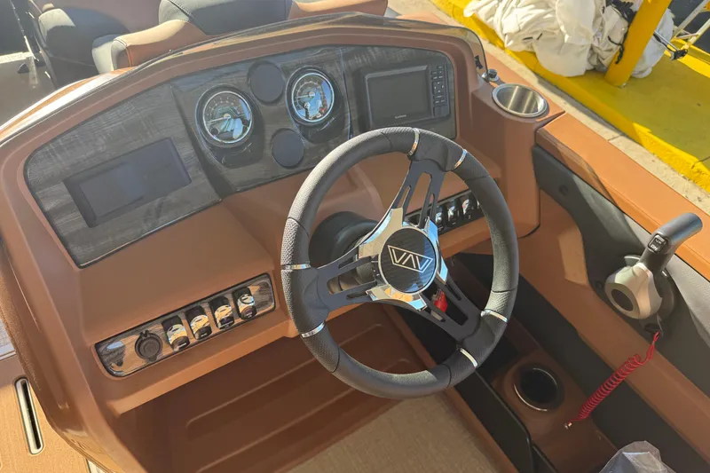 Slide: The Image of Steering console of 2026 Avalon 2385 LSZ VRL boat with modern controls and gauges. - 5