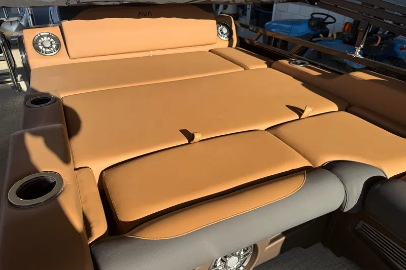 Slide: The Image of Luxurious seating area of 2026 Avalon 2385 LSZ VRL boat with cup holders and speakers. - 6
