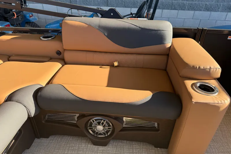 Slide: The Image of Luxurious seating on 2026 Avalon 2385 LSZ VRL boat with cup holders and speaker. - 7