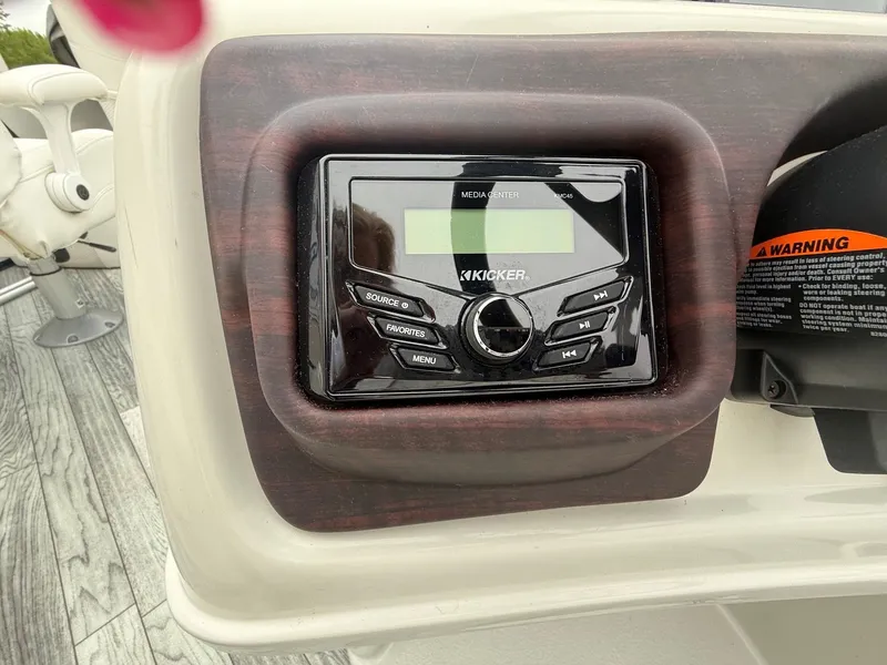 Slide: The Image of Kicker media center on a 2017 South Bay 500 Series boat. - 12