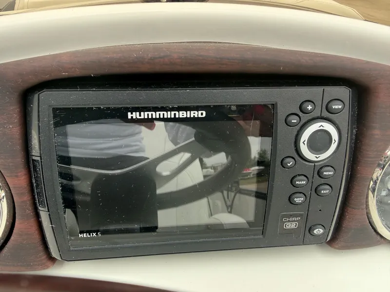 Slide: The Image of Humminbird Helix 5 fish finder on South Bay 500 Series 2017 boat. - 13