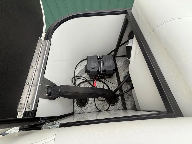 Slide: The Image of Battery compartment of a 2017 South Bay 500 Series pontoon boat. - 22