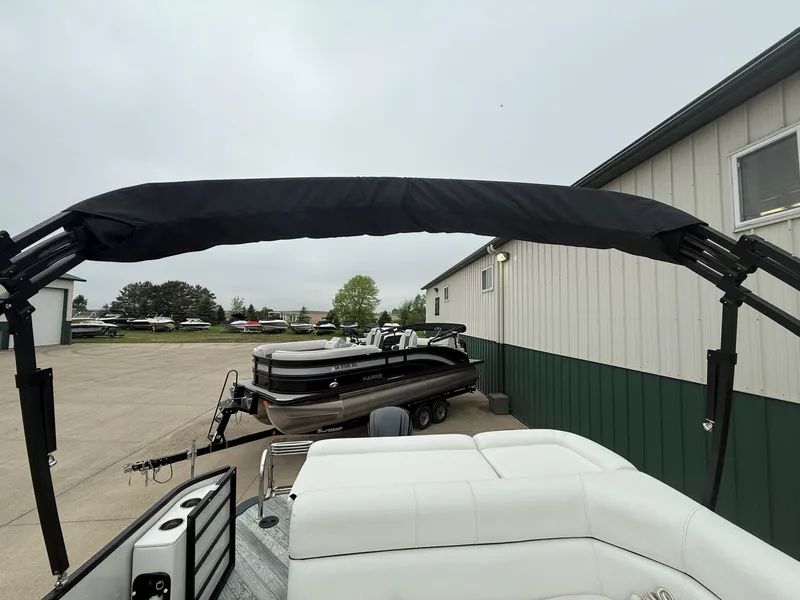 Slide: The Image of 2017 South Bay 500 Series boat with trailer outdoors. - 23