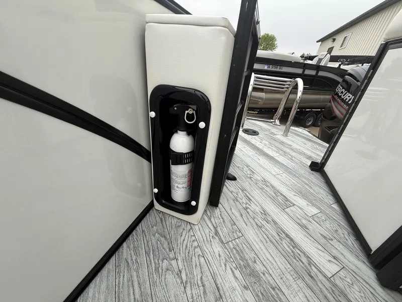 Slide: The Image of Fire extinguisher in a 2017 South Bay 500 Series boat. - 24