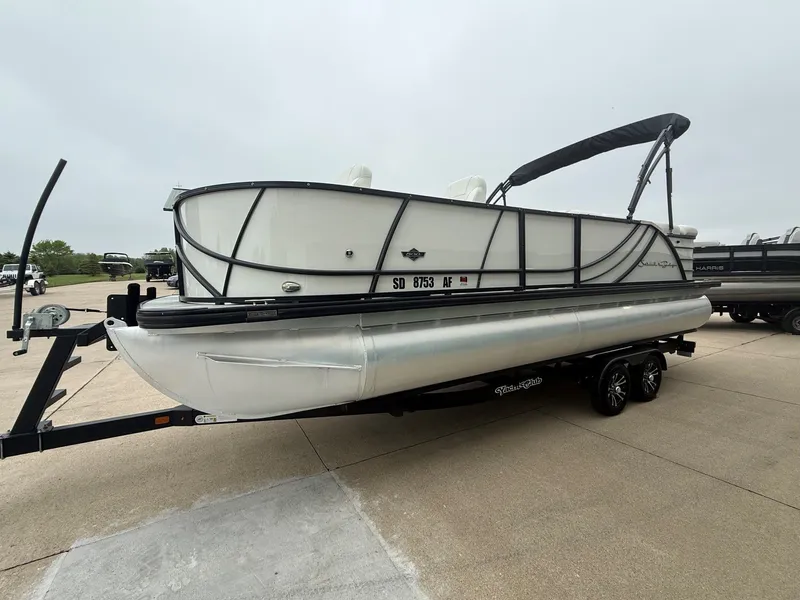 Slide: The Image of 2017 South Bay 500 Series pontoon boat on trailer. - 4