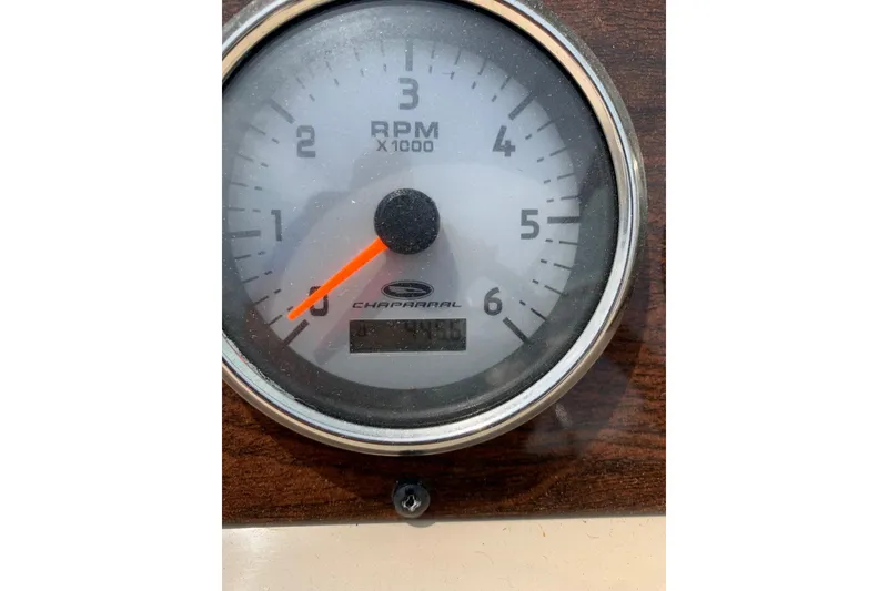 Slide: The Image of Tachometer of 2007 Chaparral 215 SSi boat, displaying RPM in thousands. - 11