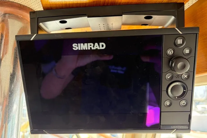 Slide: The Image of Simrad navigation system on a 1976 Grand Banks 32 Sedan boat. - 19