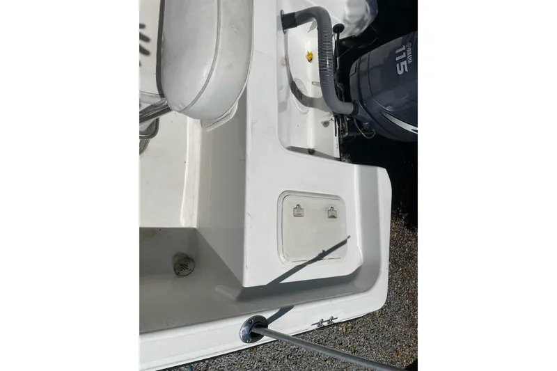 Slide: The Image of 2004 Century 1901 Bay Boat with Yamaha 115 engine, rear deck view. - 13