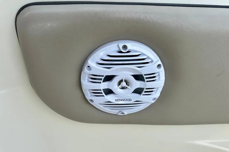 Slide: The Image of Kenwood speaker installed on 2004 Sea Ray 270 Sundeck boat interior. - 24