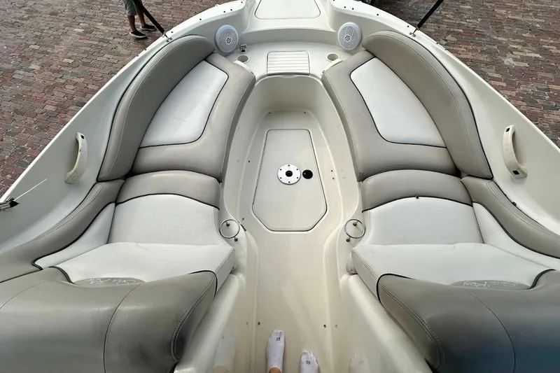 Slide: The Image of 2004 Sea Ray 270 Sundeck boat interior with spacious seating and sleek design. - 37