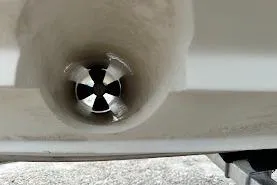 Slide: The Image of Bow thruster on a 2004 Sea Ray 270 Sundeck boat hull. - 44