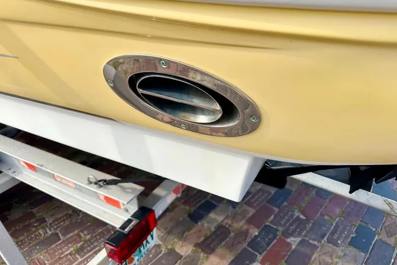 Slide: The Image of Close-up of 2004 Sea Ray 270 Sundeck boat exhaust detail on trailer. - 5