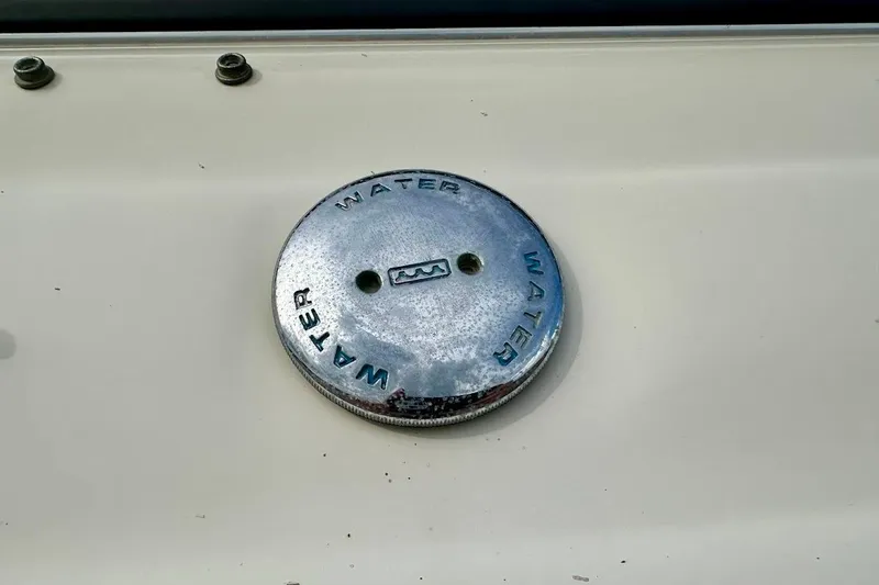 Slide: The Image of Water fill cap on 2004 Sea Ray 270 Sundeck boat deck. - 6