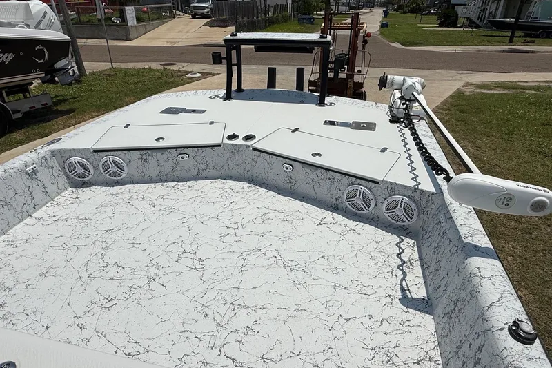 Slide: The Image of 2020 Dargel Kat 250 HDX boat deck with speakers and trolling motor. - 10