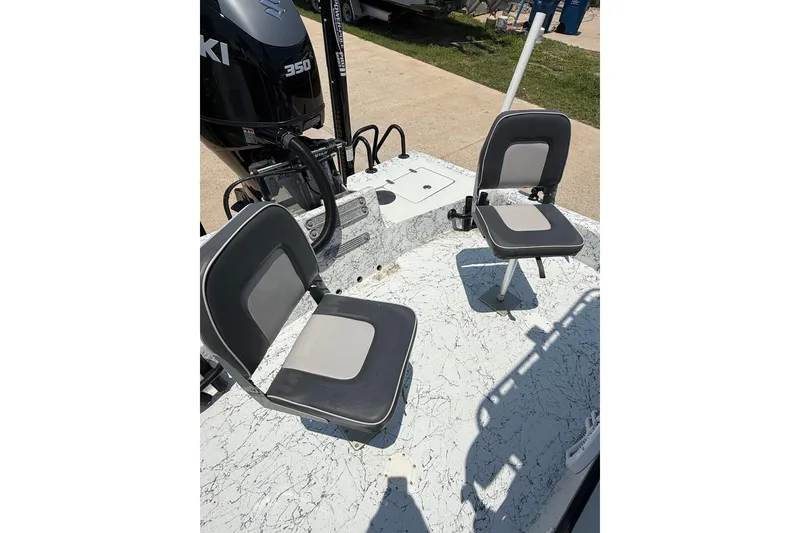 Slide: The Image of 2020 Dargel Kat 250 HDX boat interior with two seats and Suzuki 350 engine. - 11