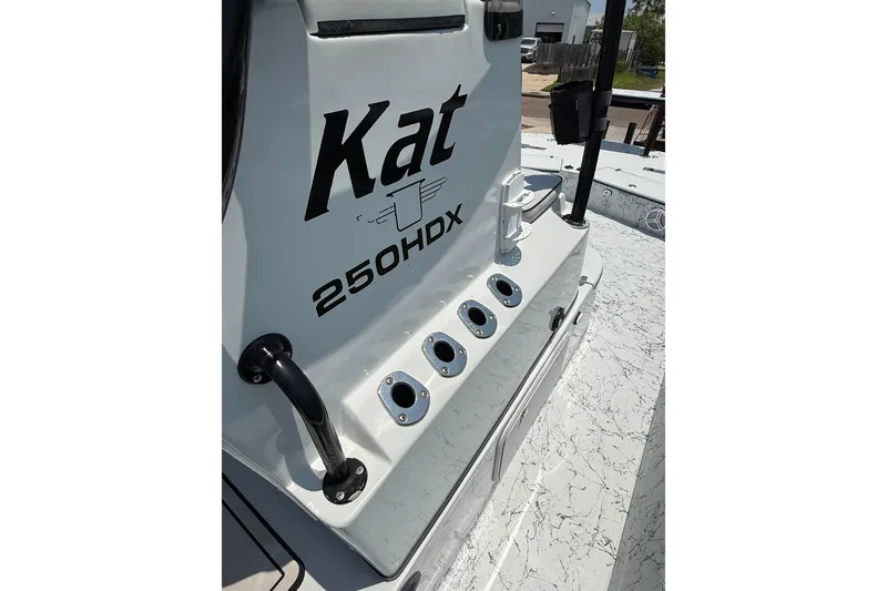 Slide: The Image of 2020 Dargel Kat 250 HDX boat with rod holders and sleek design. - 12