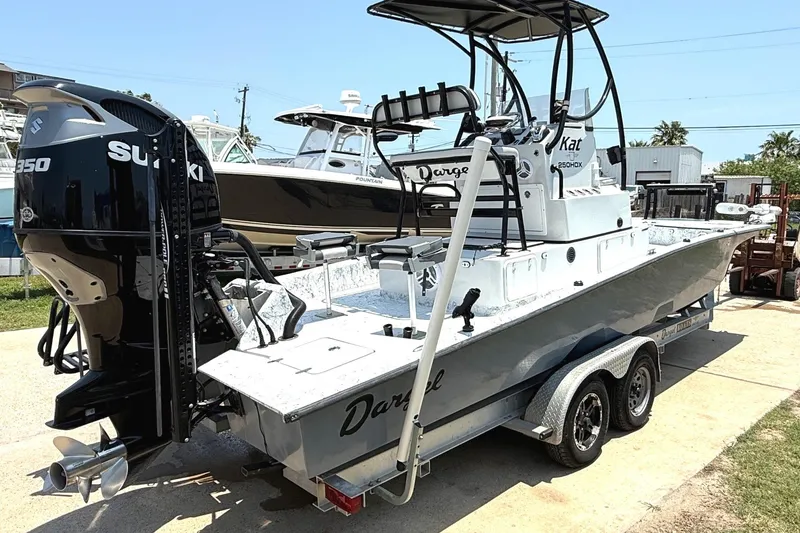 Slide: The Image of 2020 Dargel Kat 250 HDX boat with Suzuki engine on trailer. - 2