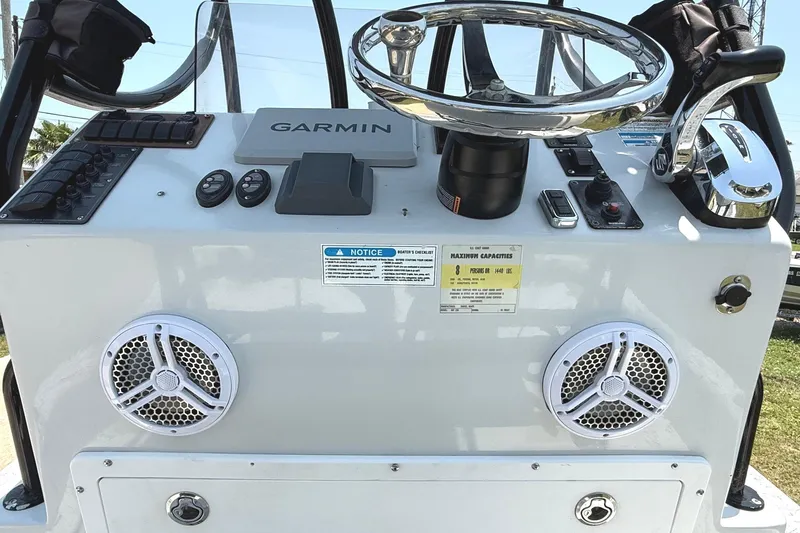 Slide: The Image of 2020 Dargel Kat 250 HDX boat console with Garmin electronics and steering wheel. - 5