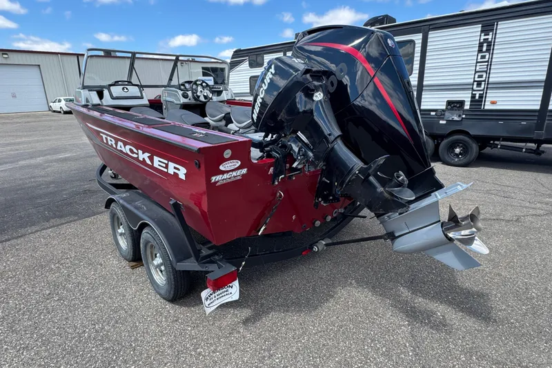 Slide: The Image of 2019 Tracker Targa V-18 WT boat with Mercury outboard motor on trailer. - 4