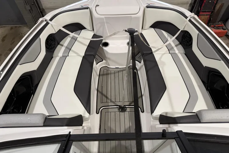 Slide: The Image of 2021 Yamaha Boats 212S interior with sleek seating and modern design. - 5