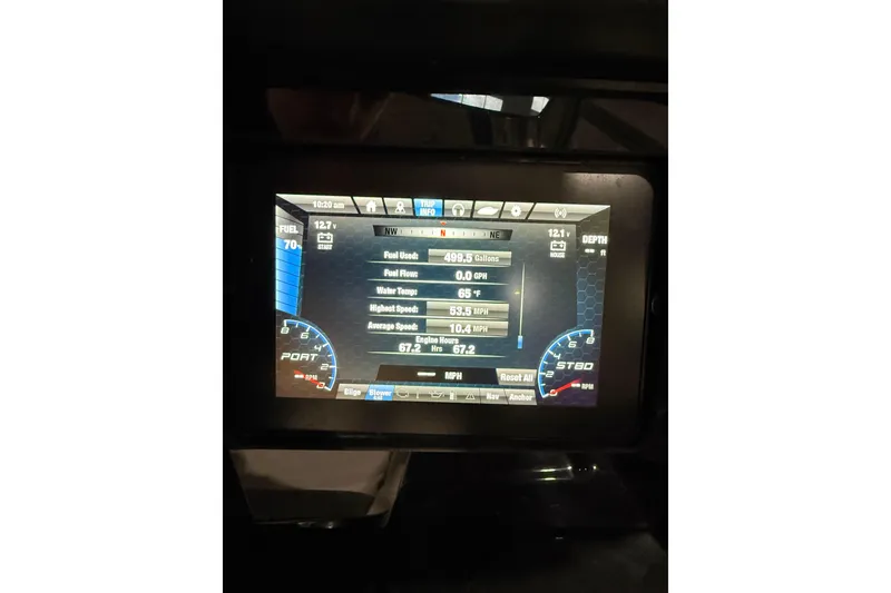 Slide: The Image of Dashboard display of a 2021 Yamaha Boats 212S showing fuel and speed metrics. - 6