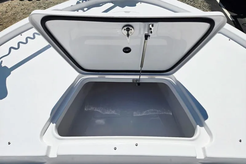 Slide: The Image of Open storage compartment on 2026 Tidewater 2210 Carolina Bay boat. - 12