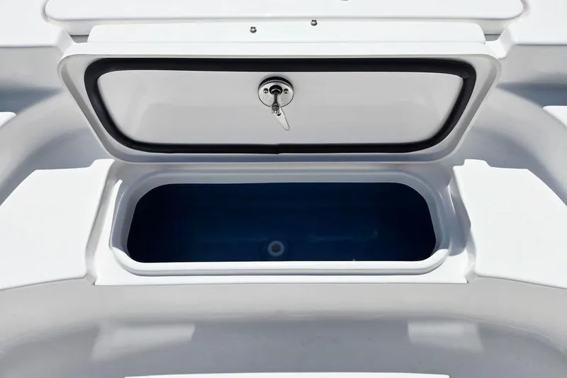 Slide: The Image of Open storage compartment on 2026 Tidewater 2210 Carolina Bay boat. - 13