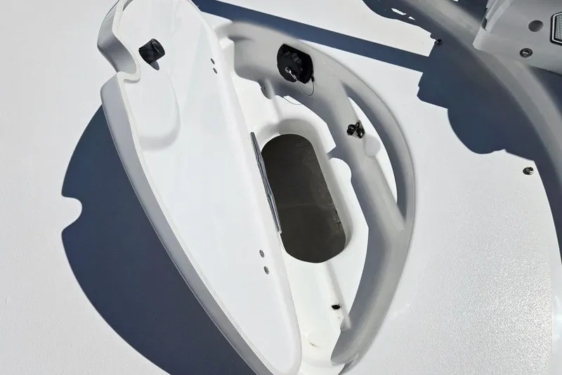 Slide: The Image of Open storage compartment on 2026 Tidewater 2210 Carolina Bay boat deck. - 15