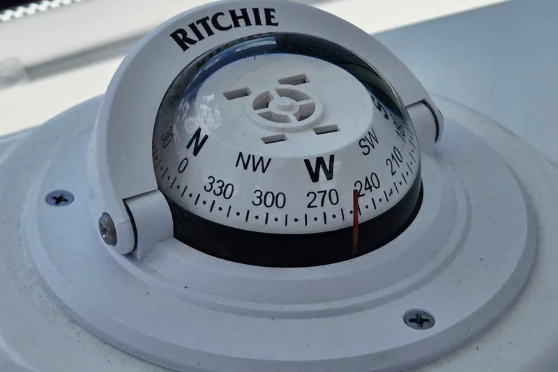 Slide: The Image of Compass on 2026 Tidewater 2210 Carolina Bay boat, showing west direction. - 21